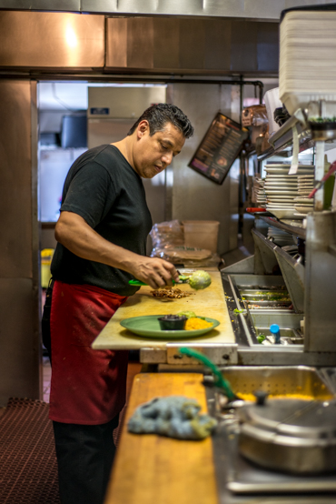 Jorge Castaneda, a cook at Las Fajitas, has been uninsured most of his adult life. The 47-year-old says he hardly gets sick, but is waiting for his employer to offer health insurance (Photo by Heidi de Marco/KHN).
