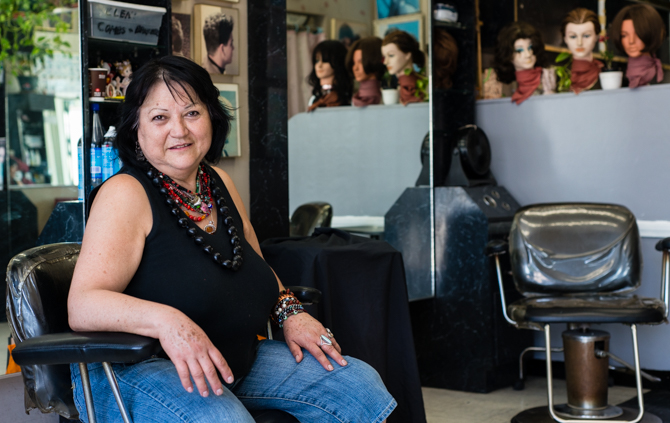 Teresa Martinez, 62, works as a hairdresser at a Koreatown hair salon. She earns about $10,000 per year and cannot afford to buy private health coverage (Photo by Heidi de Marco/KHN).