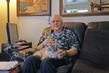 Retired California school teacher Mikkel Lawrence has hepatitis C and has struggled to afford the medicine he needs to treat it. (Photo by April Dembosky/KQED)