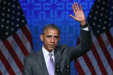  President Barack Obama waves after speaking at the Catholic Hospital Association conference June 9, 2015 in Washington. (Photo by Mark Wilson/Getty Images)