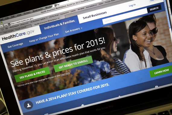 Healthcare.gov is shown during open enrollment in 2014 for signups for 2015 health insurance plans. In part due to enrollments using healthcare.gov, the uninsured rate in the U.S. dropped to 10.4 percent. (Photo by Don Ryan/AP)