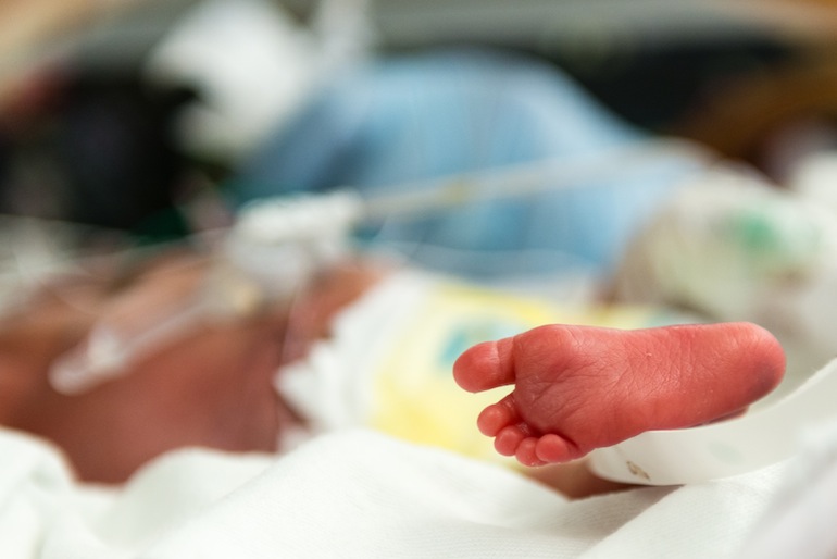 The tiny pink foot of a premature baby at the neonatal intensive-care unit at Lucile Packard Children's Hospital in Palo Alto, California on Tuesday, October 20, 2015 (Photo by Heidi de Marco/KHN).