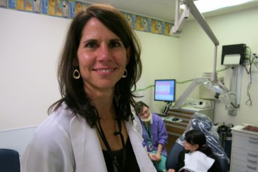 Dr. Patty Braun is a pediatrician and oral health specialist with Denver Health. She says more than half of the Latino families she sees don't drink tap water, instead opting for sugary drinks, bottled water or milk. (John Daley/CPR News)
