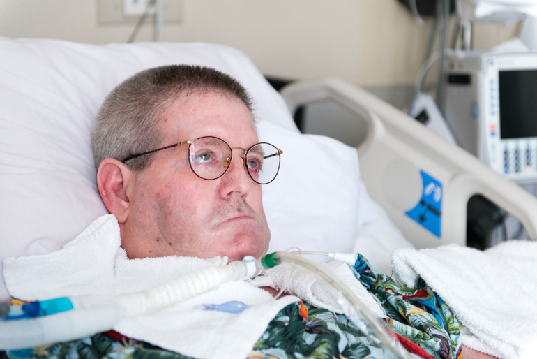 John Wilson, 61, at St. John’s Pleasant Valley Hospital in Camarillo, Calif., on Wednesday, February 24, 2016. Wilson has ALS, a degenerative neurological disorder commonly known as Lou Gehrig’s disease, and needs a ventilator to breathe. (Heidi de Marco/KHN)