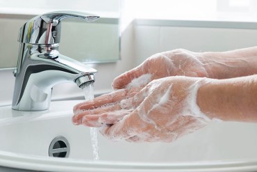 Washing hands.