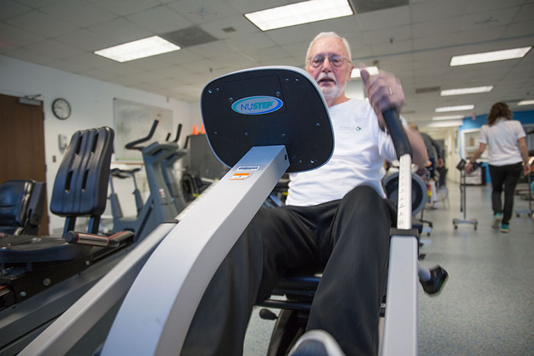 Charles Greiner works out at the University of Virginia Health System’s cardiac rehabilitation gym in Charlottesville, Va. (Francis Ying/KHN)