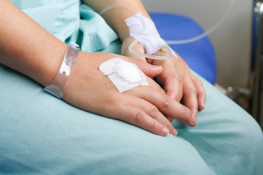 woman patient in hospital with saline intravenous (iv)