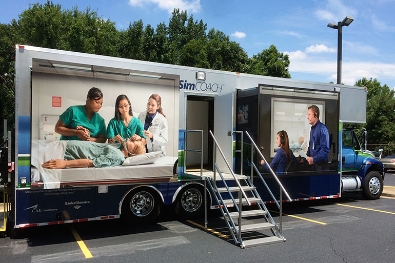 The University of South Carolina School of Medicine takes this SimCOACH -- outfitted with two simulated hospital delivery rooms -- throughout the state to train health care providers in a variety of procedures. Among the topics: the insertion and removal of contraceptive implants and IUDs.