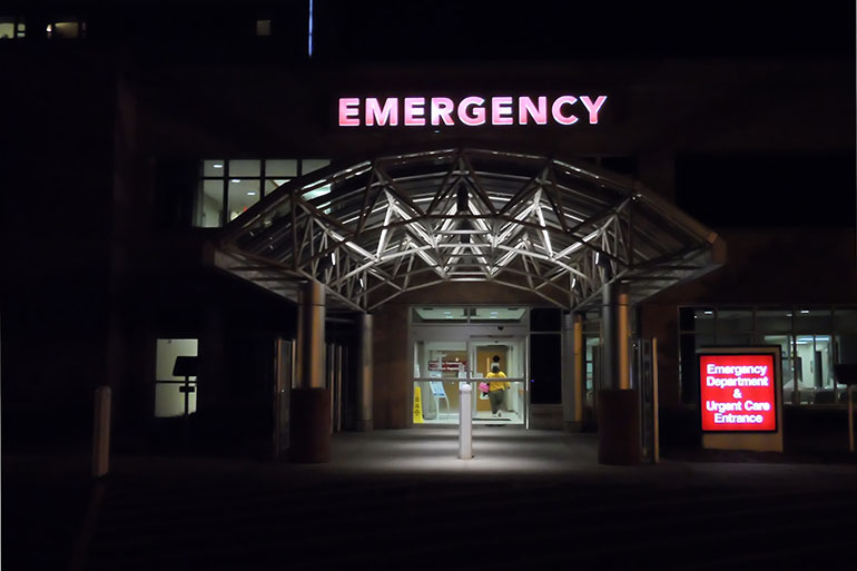 Emergency clinic sign on a modern medical building.
