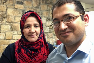 Layla Mohsin, a teacher from Iraq, and her son Karrar Al Gburi are clients of the Refugee Health Clinic. (Wendy Rigby/Texas Public Radio)