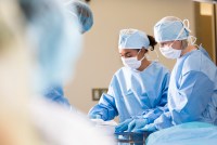 surgeons prepare instruments