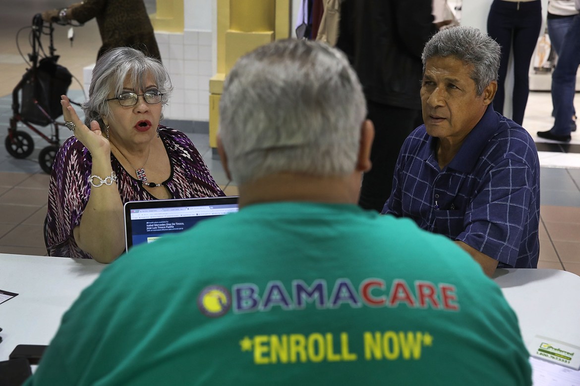 Couple being interviewed by an ACA representative