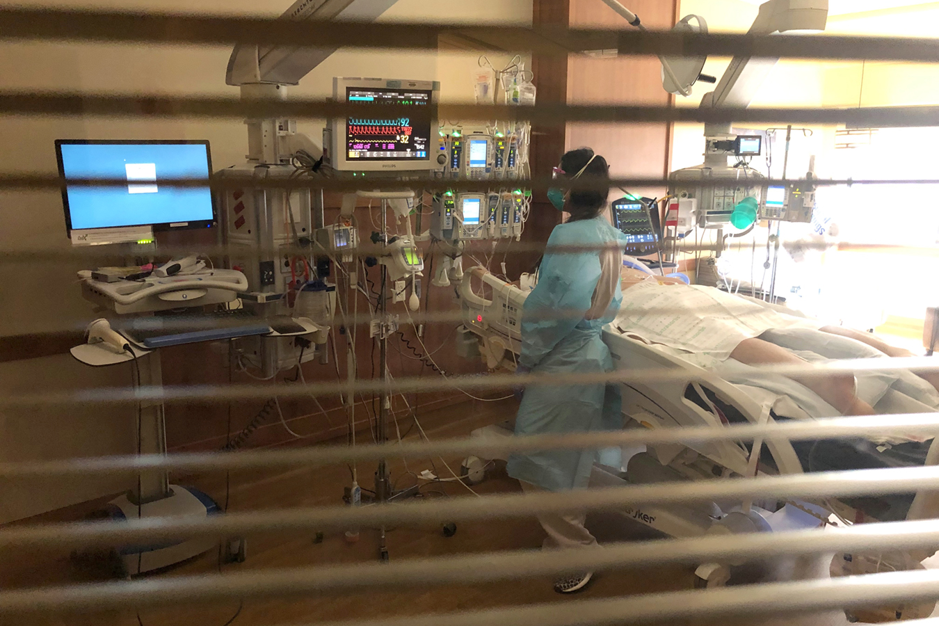 At an Overrun ICU, ‘the Problem Is We Are Running Out of Hallways’