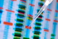 A photo shows a colorful screen with DNA mapping and a pipette.