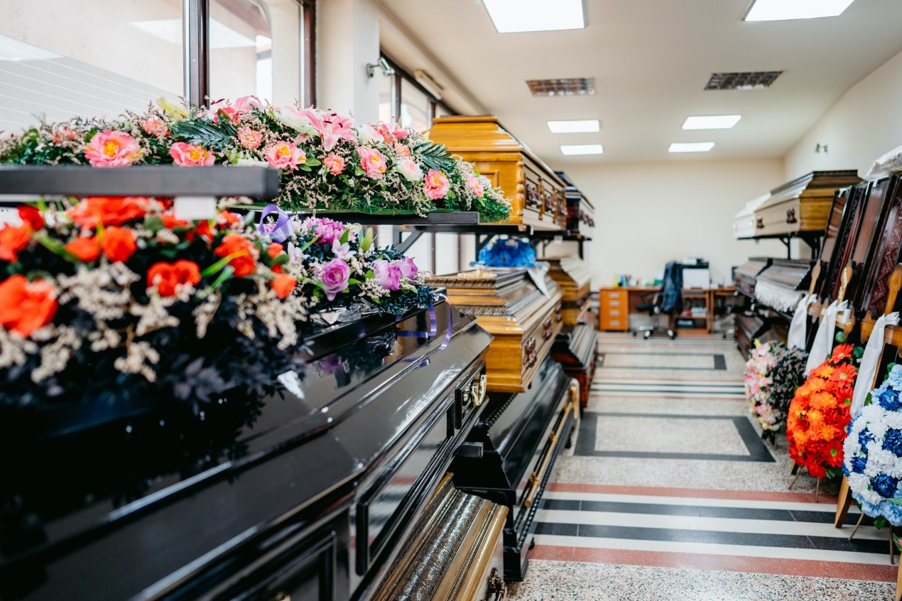interior of shop selling coffins and funeral wreaths