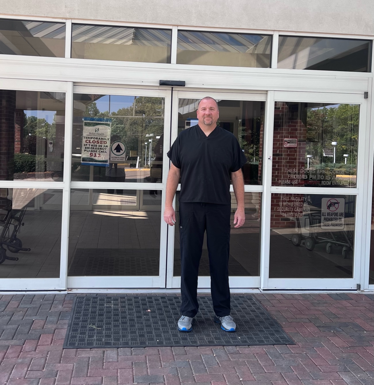 One photo shows Paul Human standing in front of the closed doors of Audrey Community Hospital.