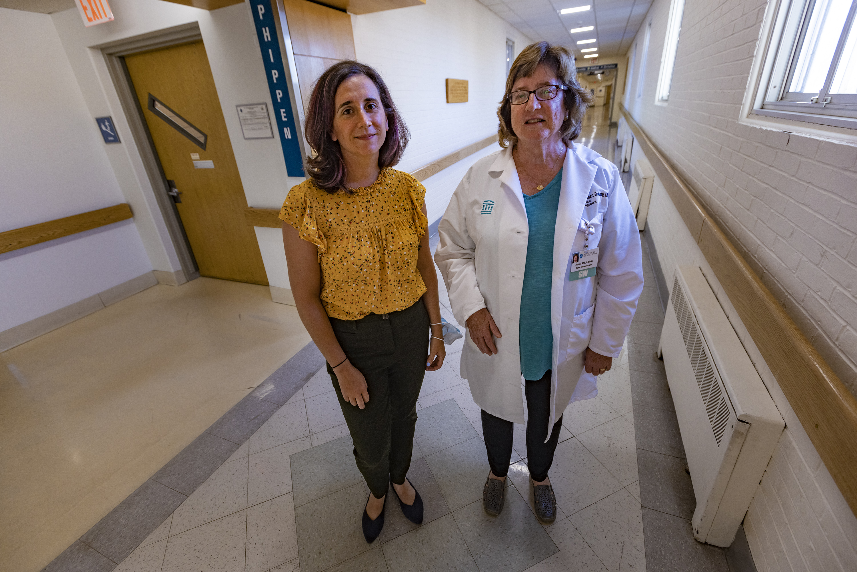One photo shows Liz Tadie and Jean Monahan-Doherty standing together inside a hospital.