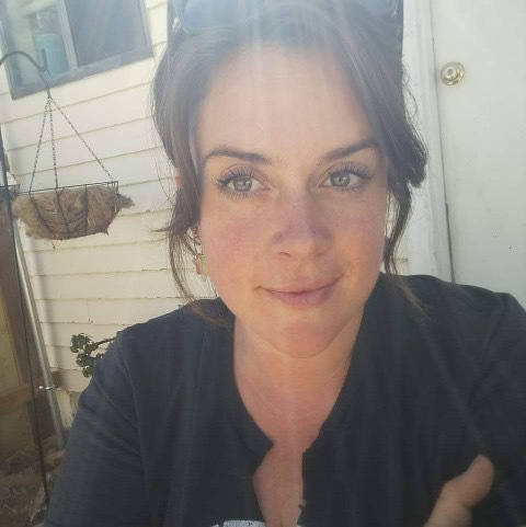 A photo shows a selfie of Stevie Noyes, taken outside.