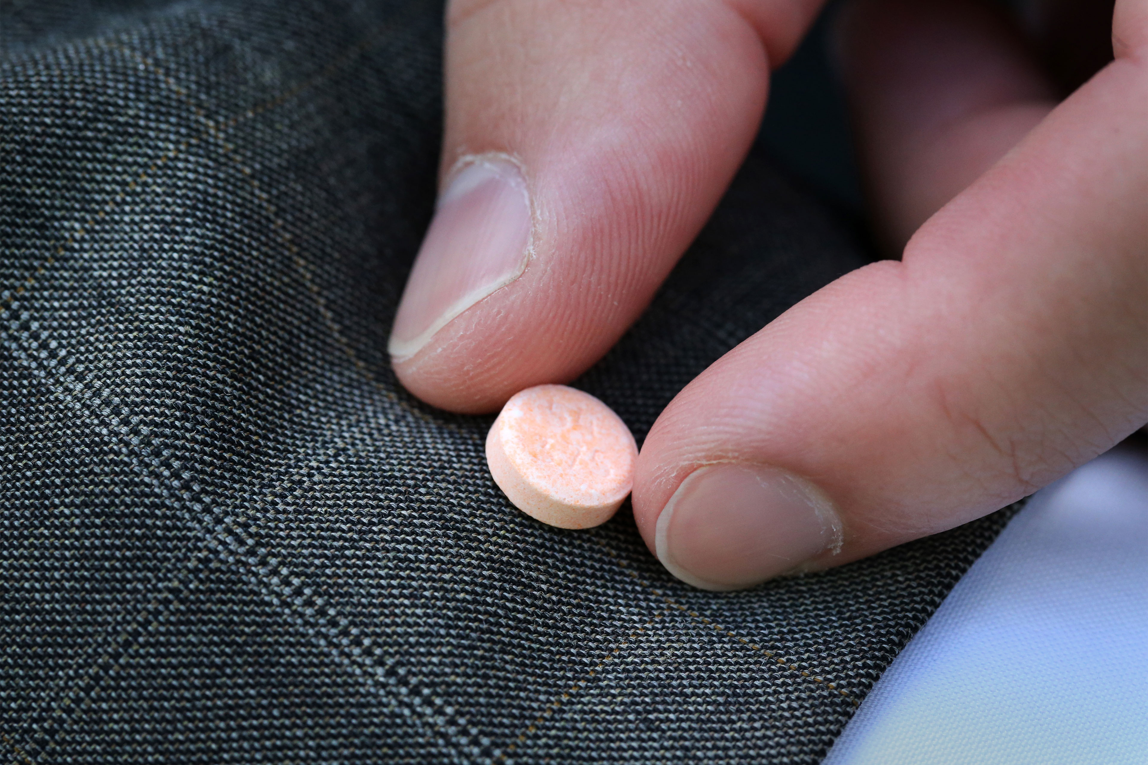 One photo shows someone holding a Suboxone tablet.