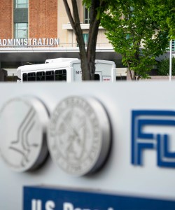 A photo shows a sign outside the FDA headquarters.