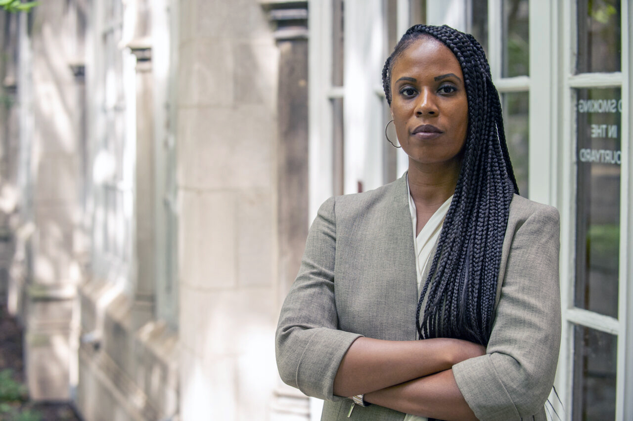 Jamelia Morgan, a professor at Northwestern College Pritzker College of Legislation, stands in a gray suit and looks without lengthen at the digicam with her palms folded very with out problems in some unspecified time in the future of her chest.