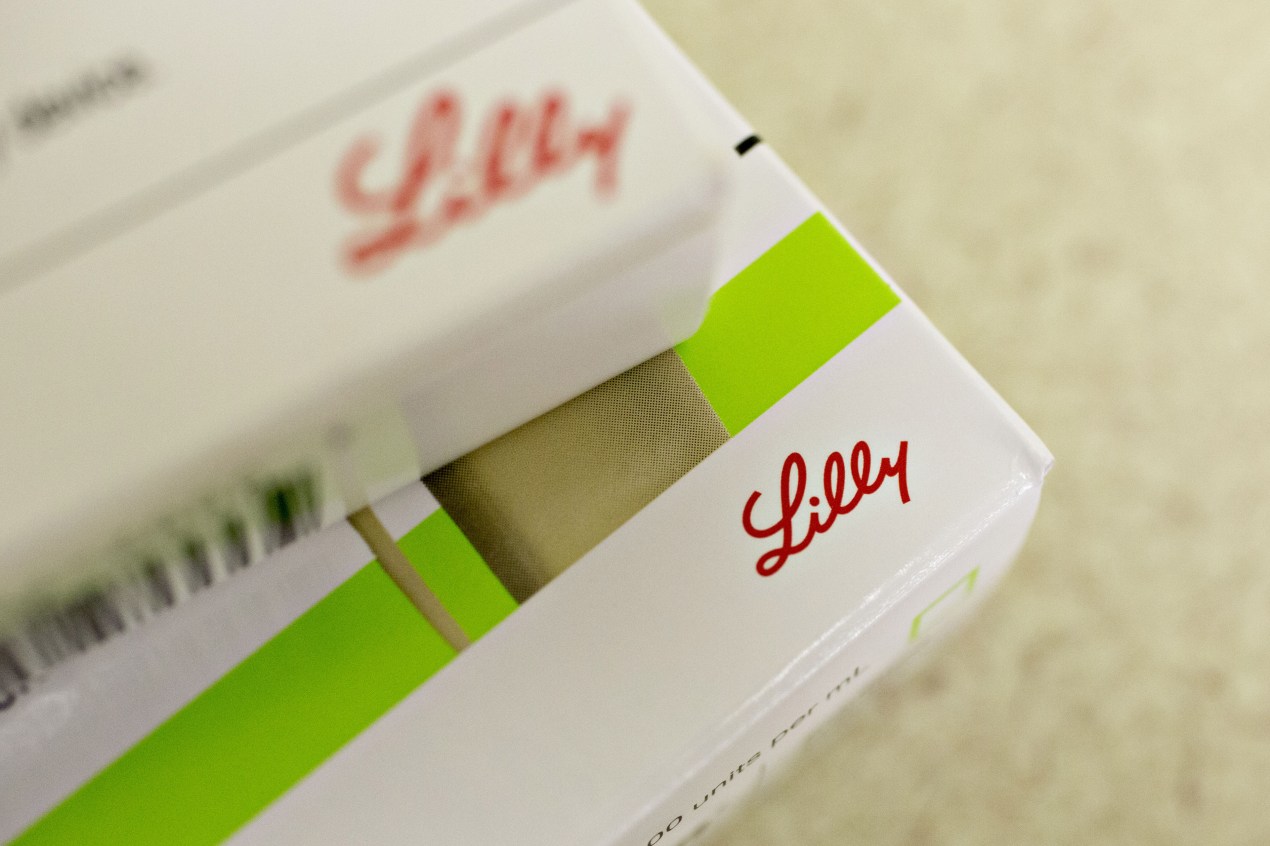 An Eli Lilly & Co. logo is seen on a box of insulin medication in this arranged photograph.
